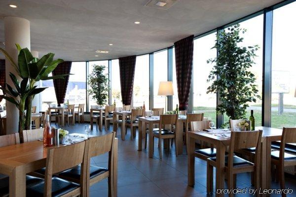 Bastion Hotel אלמיר מסעדה תמונה